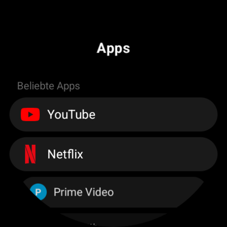 Apps-Liste auf einer Wear-OS-Uhr – YouTube, Netflix, Prime Video und weitere TV-Apps, bereit zum Belegen einer Taste