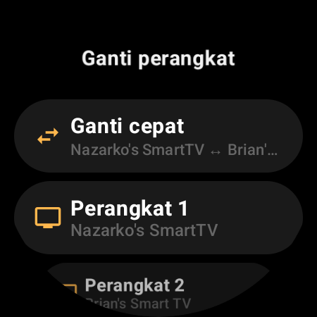 Layar “Ganti perangkat” dengan “Ganti cepat” antara dua Android TV, serta slot “Perangkat 1” dan “Perangkat 2”