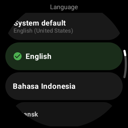 Language picker on the watch with System default, English selected, Bahasa Indonesia and Dansk