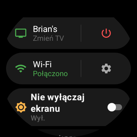 Menu zegarka z aktywnym telewizorem na górze i skrótem Zmień TV obok czerwonego przycisku zasilania