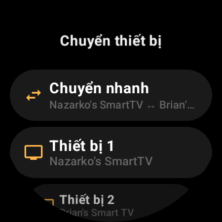 Màn hình “Chuyển thiết bị” với “Chuyển nhanh” giữa hai Android TV, cùng các ô “Thiết bị 1” và “Thiết bị 2”